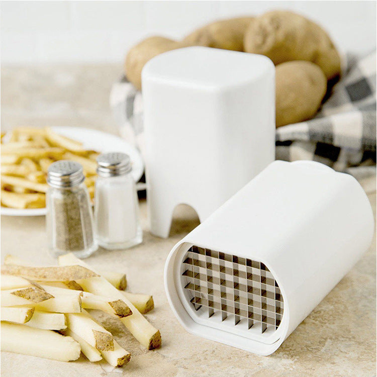 Belro non-slip vegetable slicer with sharp stainless steel blades on a kitchen countertop, showing the slicer and vegetables ready for cutting.