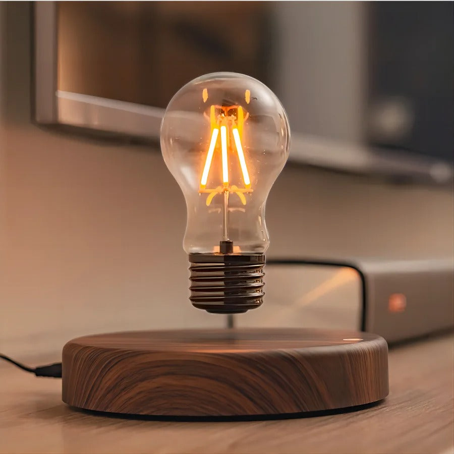 Belro magnetic levitating LED light bulb floating above a base, modern outdoor home and garden lighting display