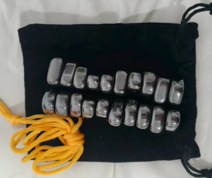 Foldable magnetic travel chess game by BowLift featuring a portable strategy board with chess pieces in a closed position.