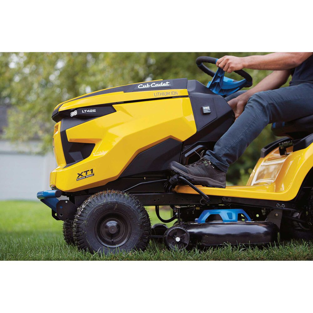 Casavibeo Cub Cadet XT1 LT42E 42-inch electric lawn tractor with cutting deck and ergonomic seat, ready for outdoor yard work.