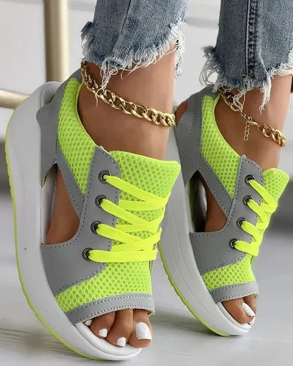 Belro contrast paneled cutout lace-up muffin sandals featuring open toe design and chunky sole on a neutral background.