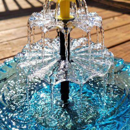 Mivoza solar bird bath fountain with two-tier garden water feature, no power needed, surrounded by greenery in a garden setting.