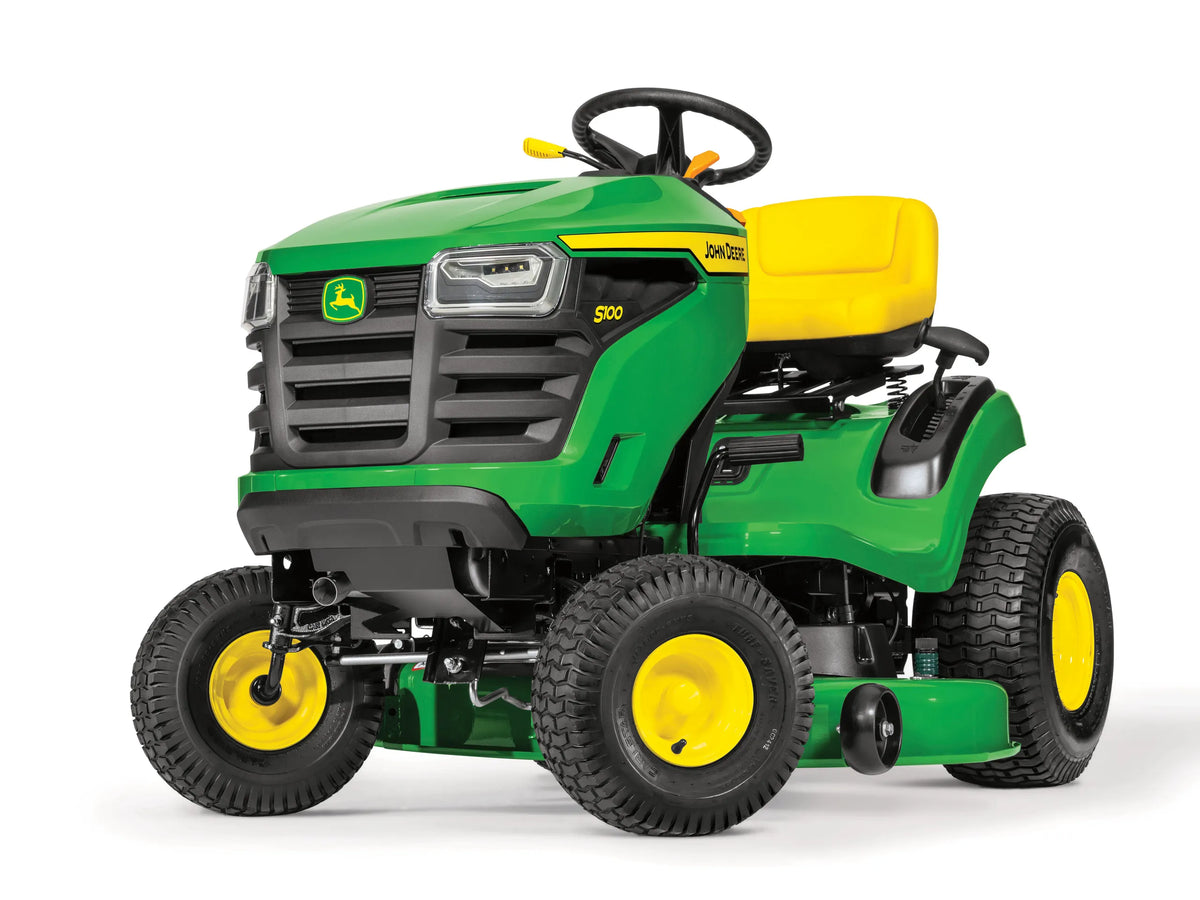 John Deere S100 42-inch 17.5 HP hydrostatic riding lawn tractor, shown in a yard setting with cutting deck visible.