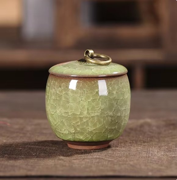 Handcrafted ceramic dog and cat urn by BowLift, featuring a memorial keepsake design for pet remembrance.