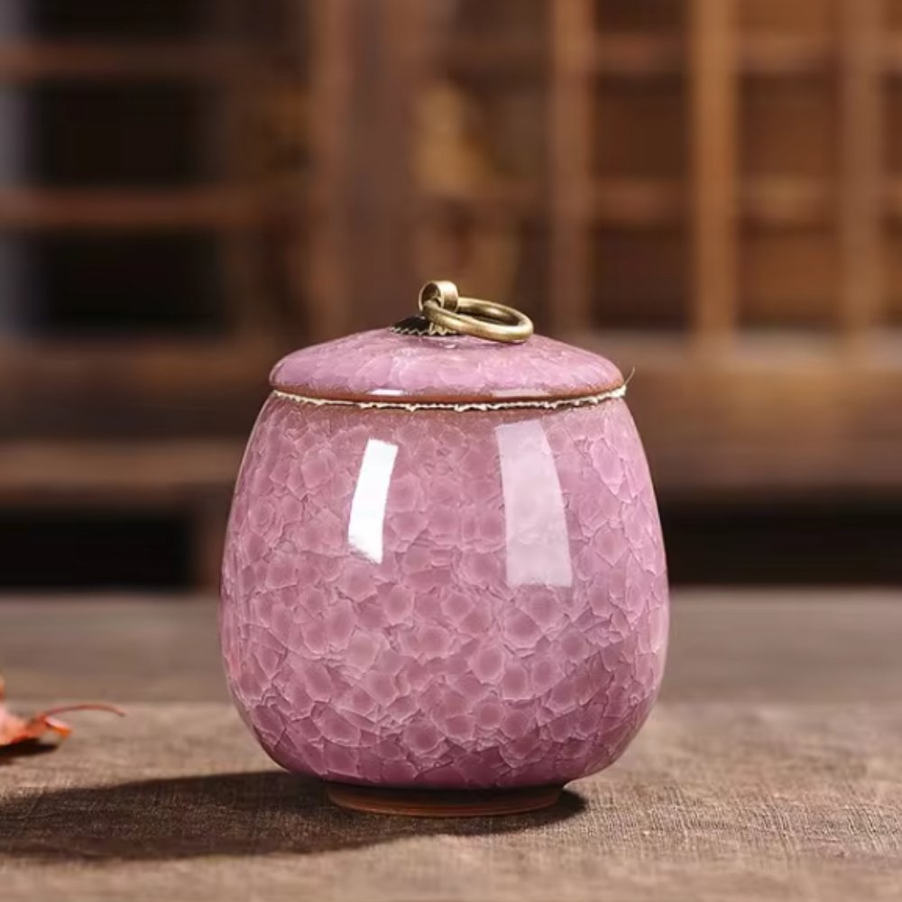 Handcrafted ceramic pet urn by BowLift, featuring a decorative design, for memorial keepsake of dogs and cats.
