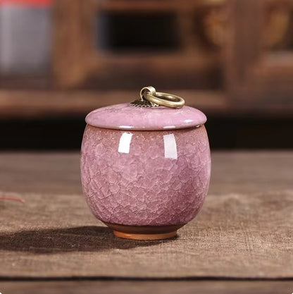Handcrafted ceramic pet urn for dogs and cats, featuring delicate details and a smooth finish, ideal for memorial keepsakes.
