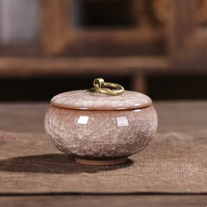 Handcrafted ceramic pet urn by BowLift, featuring a detailed design, for memorial keepsake of dogs and cats.
