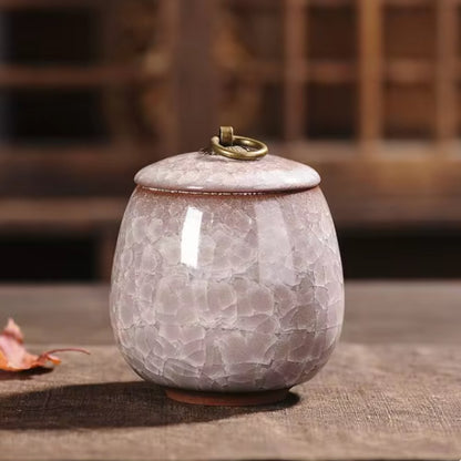 Handcrafted ceramic pet urn for dogs and cats, featuring a detailed design, used as a memorial keepsake for beloved pets.