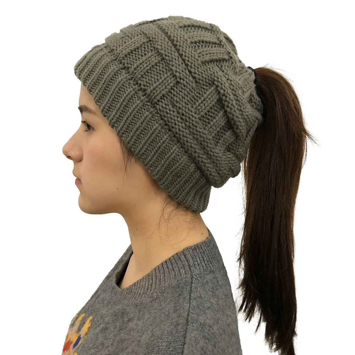 Gray women's Belro knit beanie with a stylish ponytail opening, perfect for winter accessories and cold weather warmth.
