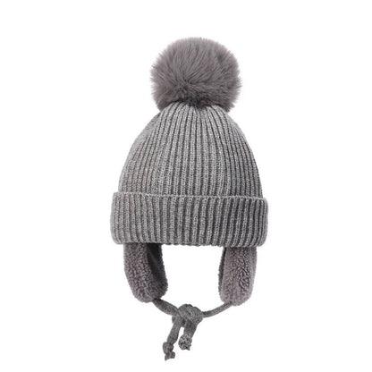 Gray kids knit beanie winter hat with earflaps, Belro brand, cozy and warm accessory for cold-weather outdoor wear.