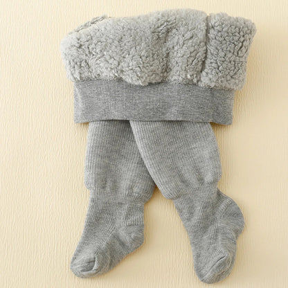 Gray kids winter fleece-lined leggings by Belro, soft and warm clothing for cold weather, shown laid flat.