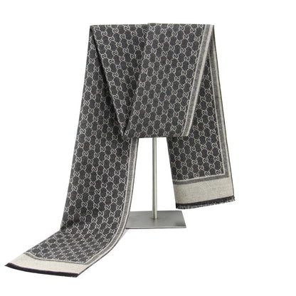Gray Belro luxury cashmere feel winter scarf draped, showcasing soft, cozy fabric and stylish design for cold weather accessories.