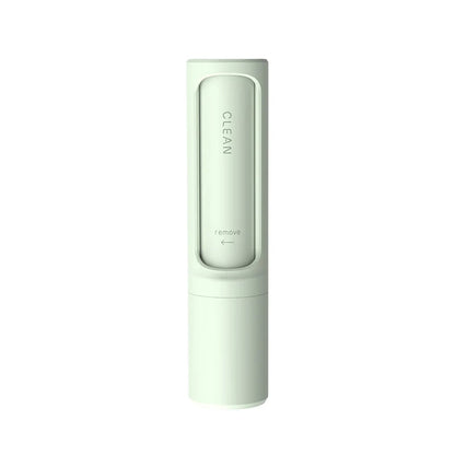Green Belro reusable lint roller and pet hair remover brush for home and outdoor cleaning, with textured surface for easy hair removal.