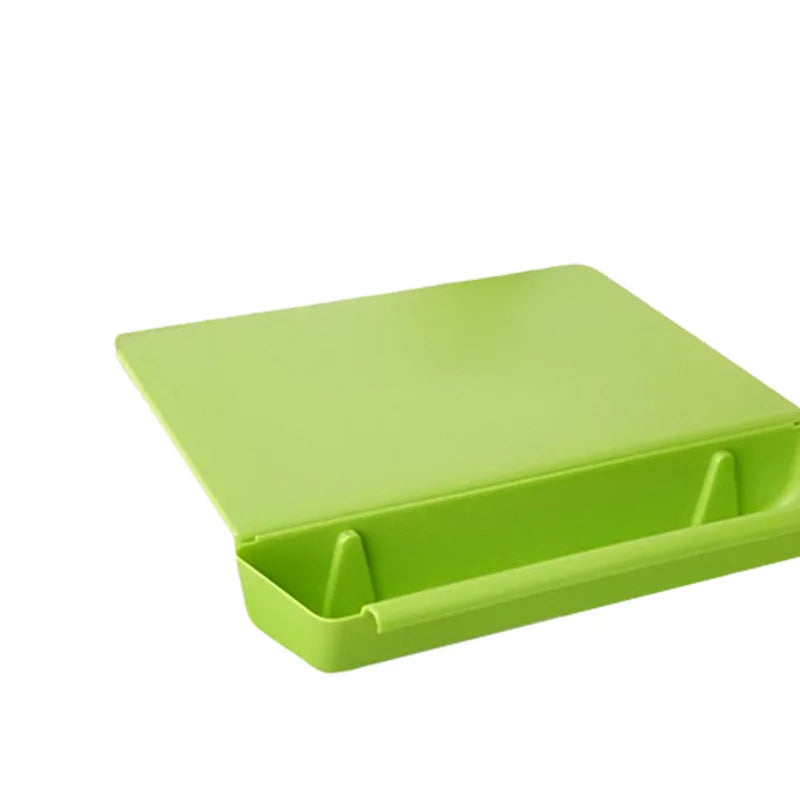 Green Belro 2-in-1 cutting board with integrated container tray for easy food prep and storage in kitchen and dining areas.