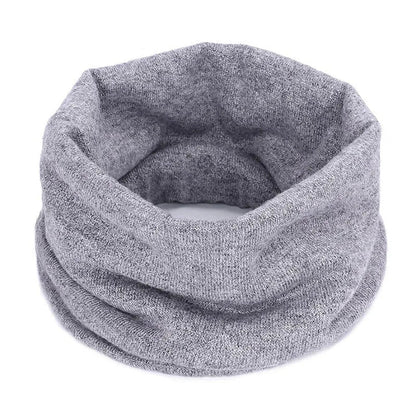 Grey Belro cozy cashmere winter scarf neck warmer, soft and warm accessory for cold weather, shown draped around the neck.