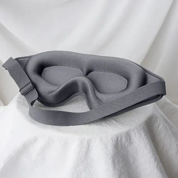 Belro 3D sleep mask made of memory foam, with contoured design for comfortable eye coverage and sleep support.