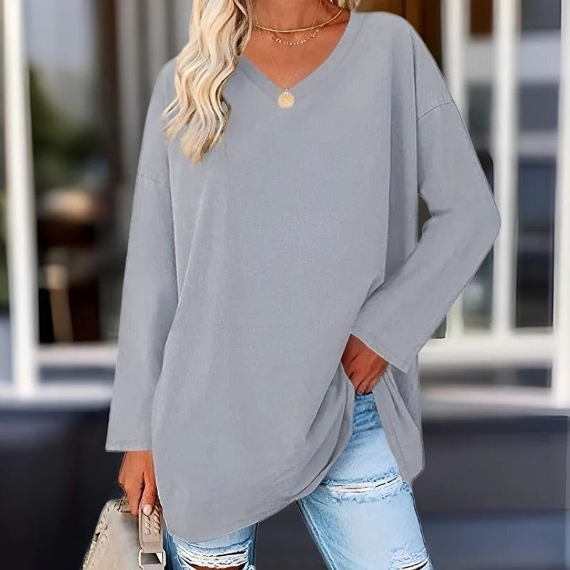 Belro long-sleeved V-neck shirt for women, featuring a comfortable fit and stylish design, shown in a casual clothing image.