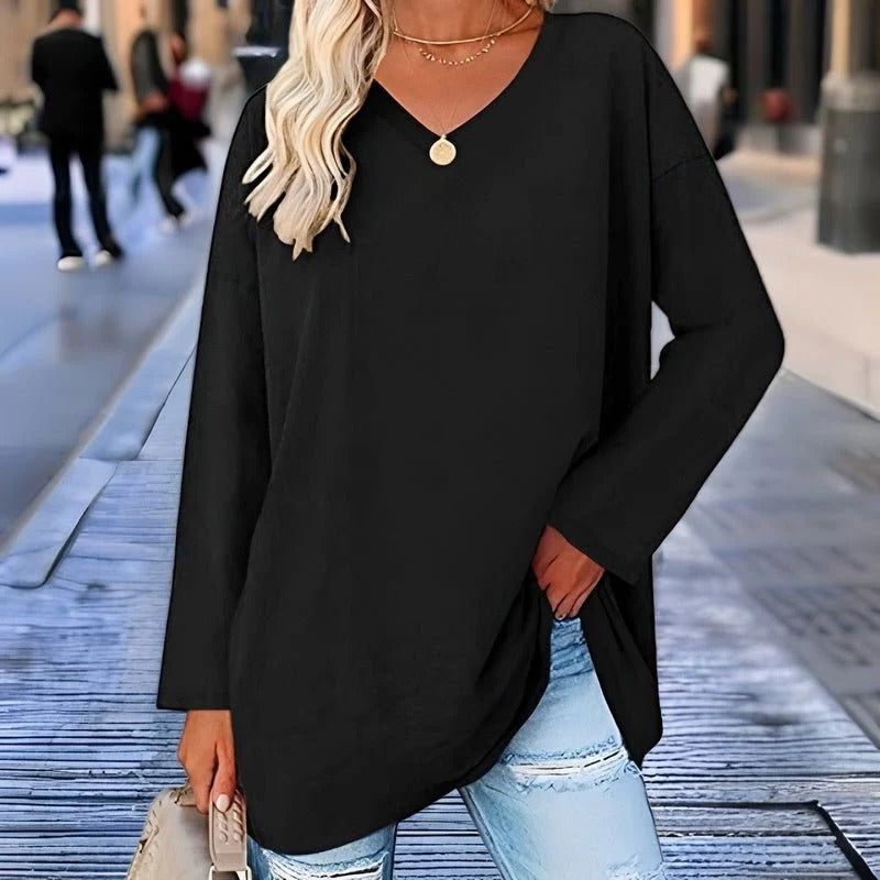 Belro women's long-sleeved V-neck shirt, made of soft, comfortable fabric, shown in a relaxed fit on a model.
