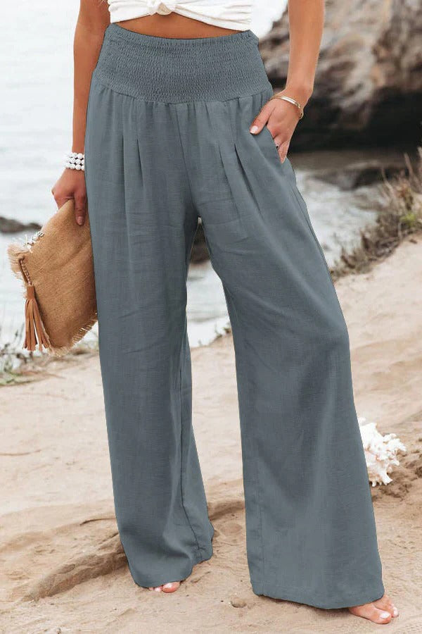 Belro cotton and linen pants in neutral tones, showcasing comfortable, lightweight fabric and relaxed fit for casual wear.