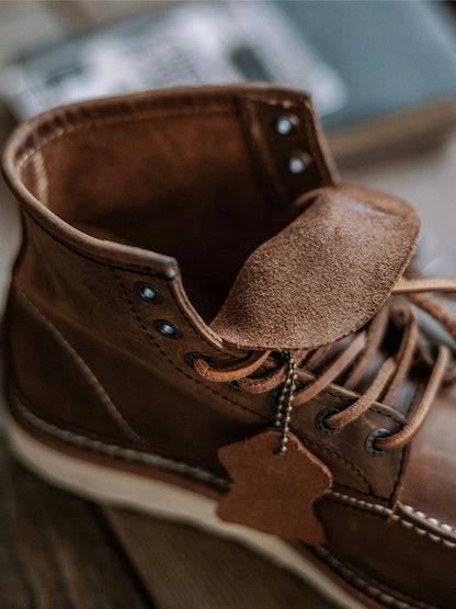 Men's full grain leather moccasin toe work boots by Belro, featuring sturdy construction and durable outsole for industrial use.