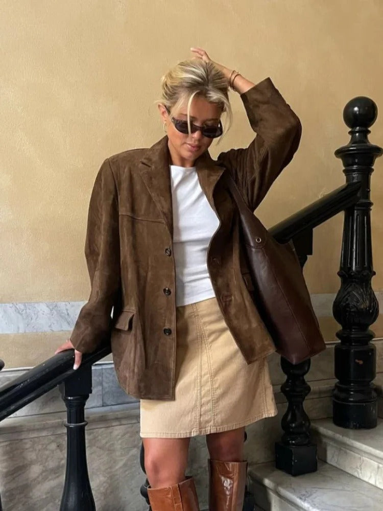 Elegant brown suede women's jacket by Belro, showcasing a stylish tailored fit and soft suede texture.