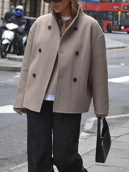Loose-fitting women's jacket with button closure by Belro, stylish casual outerwear for modern fashion.