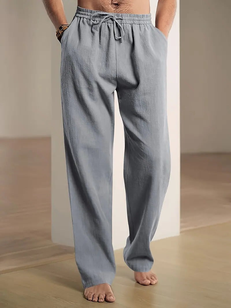 Belro men's baggy linen pants shown on a model, relaxed fit, lightweight fabric, casual men's clothing for comfort and style.