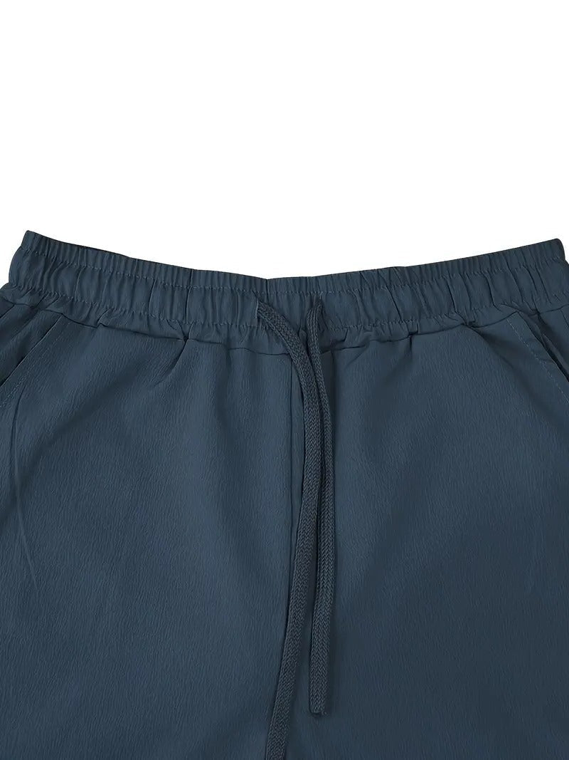 Belro men's baggy linen pants, relaxed fit, lightweight fabric, casual style, shown in neutral color.