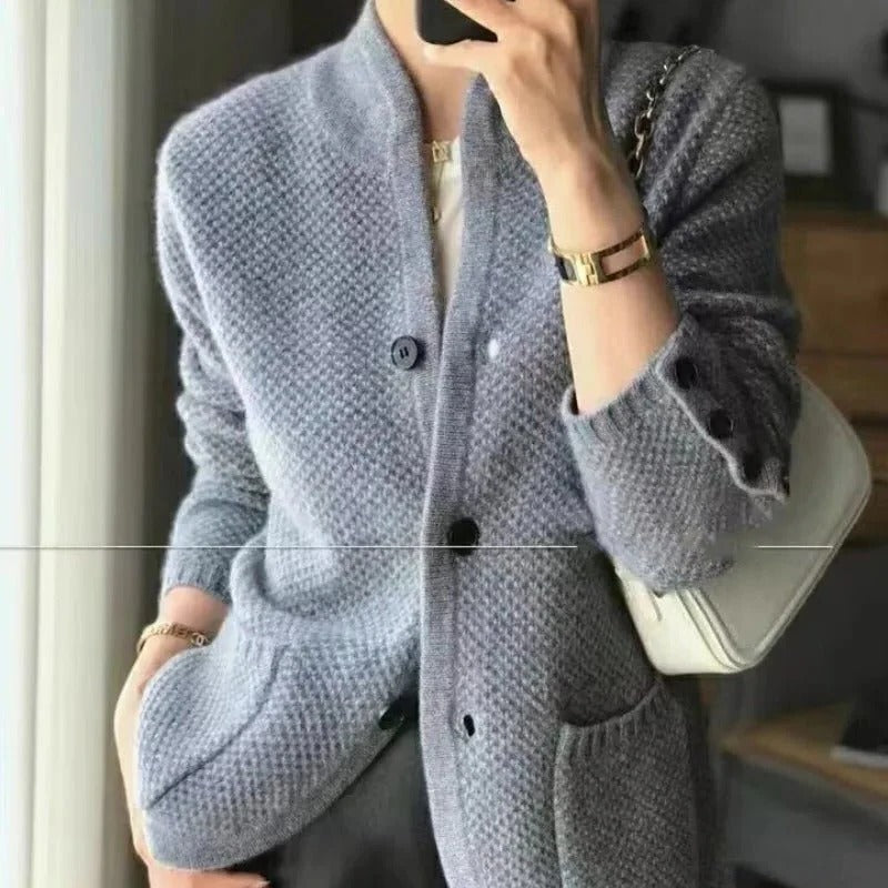 Belro soft button blazer in structured knit fabric, featuring tailored fit and classic design, suitable for stylish professional or casual wear.