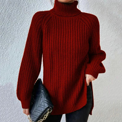 Belro turtleneck sweater in cozy knit fabric, featuring a classic high neckline and long sleeves, displayed on a neutral background