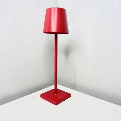 Belro contemporary cordless modern table lamp with sleek design, illuminated on a desk in a stylish interior setting.