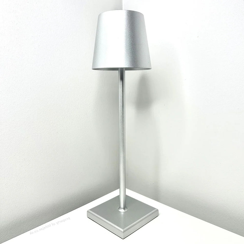 Belro contemporary cordless modern table lamp with sleek design and soft LED lighting on a desk surface.
