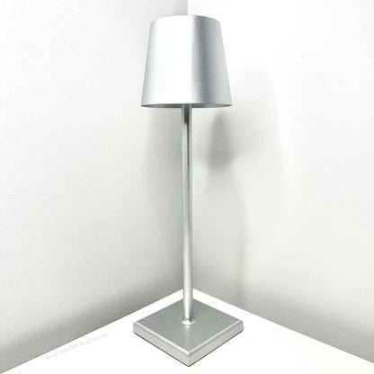 Belro contemporary cordless modern table lamp with sleek design and soft LED lighting on a desk surface.