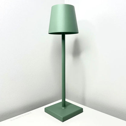 Modern Belro cordless table lamp with sleek design, illuminated on a desk, perfect for contemporary lighting decor.