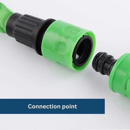 Belro Flexy garden hose coiled outdoors with a spray nozzle, showcasing its flexible design for gardening and outdoor watering.