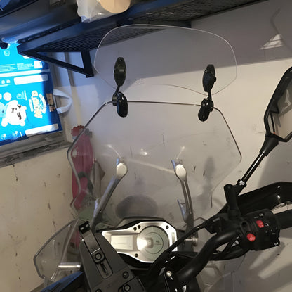 Belro motorcycle windshield extension mounted on a motorcycle, providing added wind protection for riders.