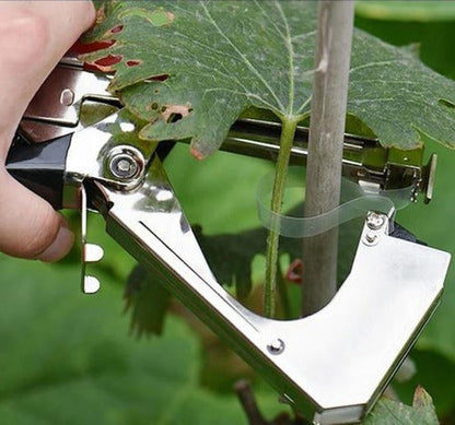 Belro plant strappers for outdoor gardening, showing green flexible ties used to support and secure plants in the garden.