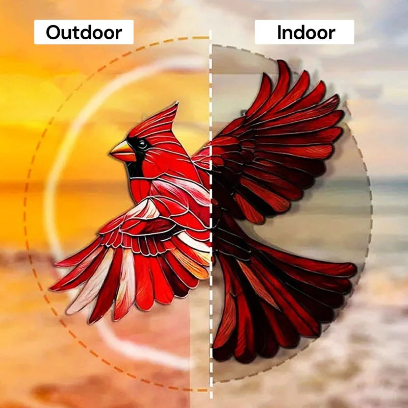 Colorful hummingbird suncatcher by Belro, hanging in a garden, with vibrant glass wings catching sunlight for a decorative outdoor display.