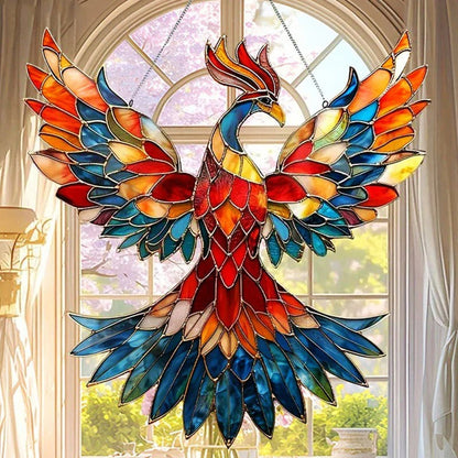 Colorful hummingbird suncatcher by Belro hanging in a garden, reflecting sunlight with vibrant glass wings and detailed design.