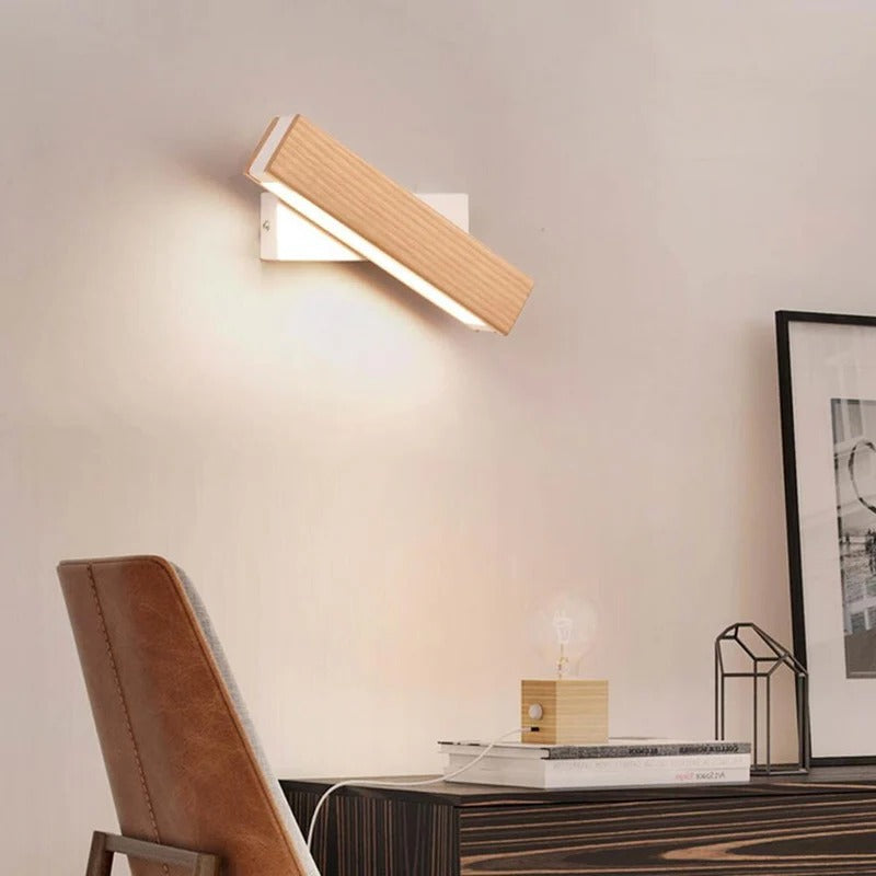 Belro wall lamp for outdoor use, mounted on a garden wall, providing stylish and functional outdoor lighting.