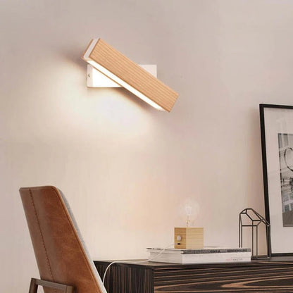 Belro wall lamp for outdoor use, mounted on a garden wall, providing stylish and functional outdoor lighting.