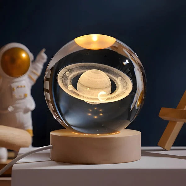 Belro Sphere Lamp emits a soft glow, featuring a smooth, round design perfect for ambient lighting in bedrooms or living rooms.