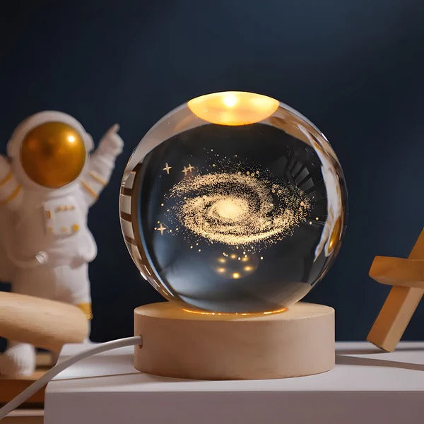 Belro Sphere Lamp emitting soft glow, modern electronic night light with a smooth, spherical design for ambient lighting in a room.