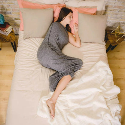 Belro adult swaddle blanket in soft fabric, displayed folded on a bed, ideal for cozy home bedding and relaxation.