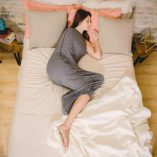 Belro adult swaddle blanket in soft fabric, displayed folded on a bed, ideal for cozy home bedding and relaxation.