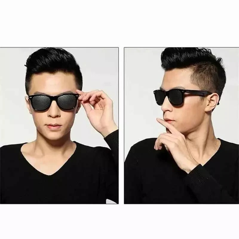Belro corrective pinhole glasses with clear lenses and black frames, designed for vision correction and eye health.