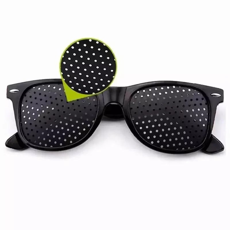 Belro corrective pinhole glasses with clear lenses designed to improve focus, shown in a close-up image.