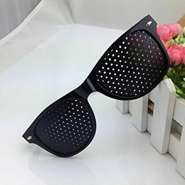 Belro corrective pinhole glasses with clear lenses, designed to improve vision, shown on a white background.