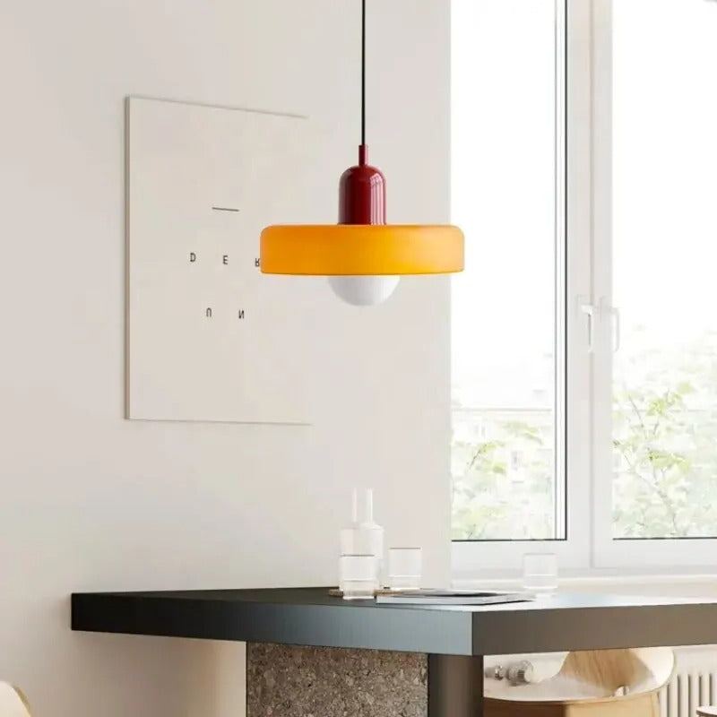 Belro hanging pendant light with a sleek, modern design, featuring a metal fixture and decorative glass shade.