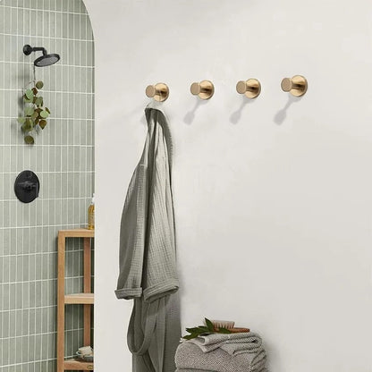 Belro suction cup hooks attached to a light bulb socket, used for hanging lightweight electronics or accessories securely.